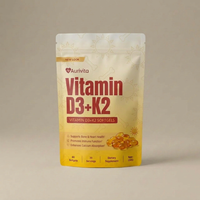 A stand-up pouch of Aurivita Vitamin D3+K2 softgels, featuring a white and yellow design with red text, on a neutral beige background.